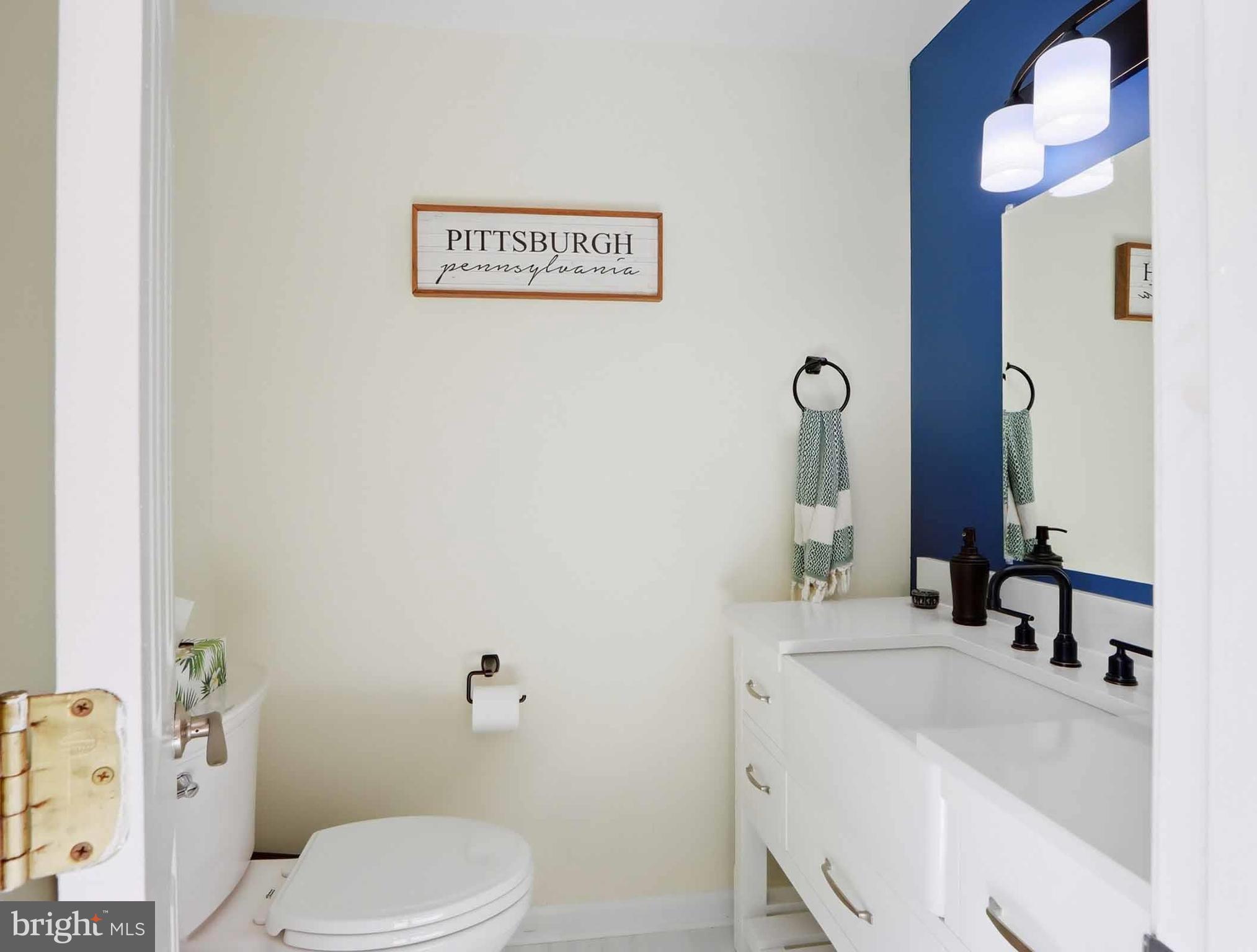 12208 Stoney Bottom Road Germantown, MD 20874 - Photo 41 of 52 a bathroom with a sink vanity granite and toilet