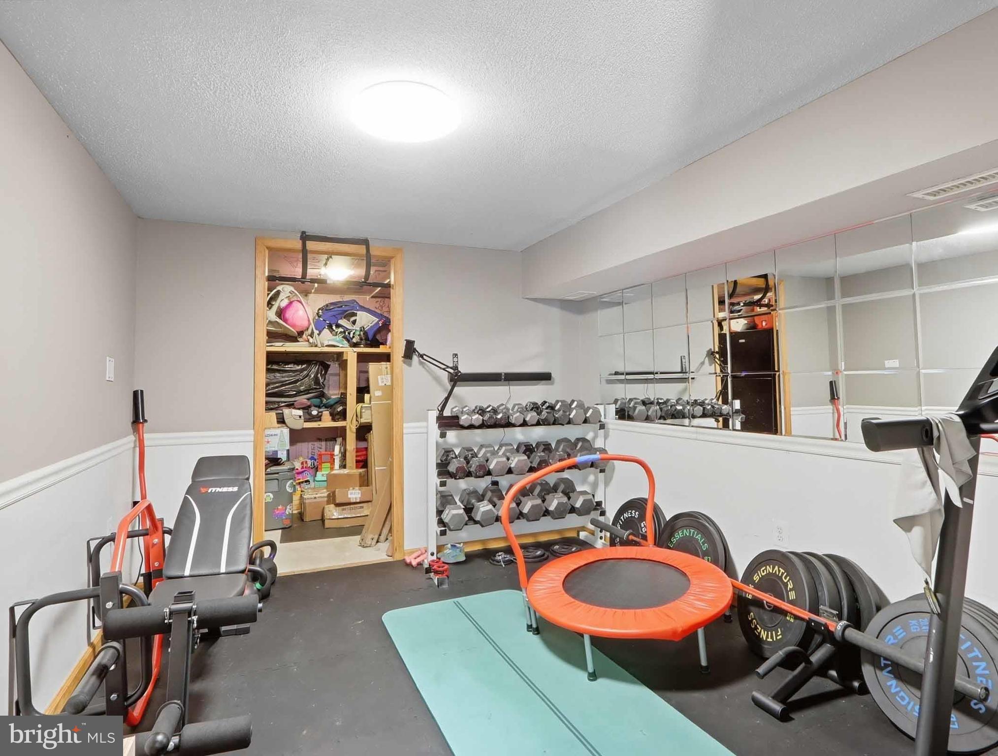 12208 Stoney Bottom Road Germantown, MD 20874 - Photo 43 of 52 a view of a room with gym equipment