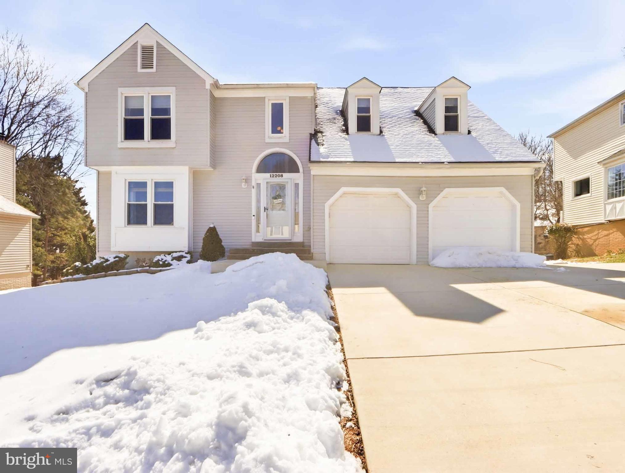 12208 Stoney Bottom Road Germantown, MD 20874 - Photo 5 of 52 a front view of a house with a yard