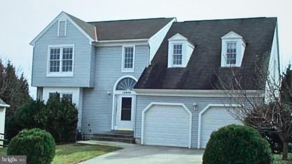 12208 Stoney Bottom Road Germantown, MD 20874 - Photo 52 of 52 a front view of a house with garden