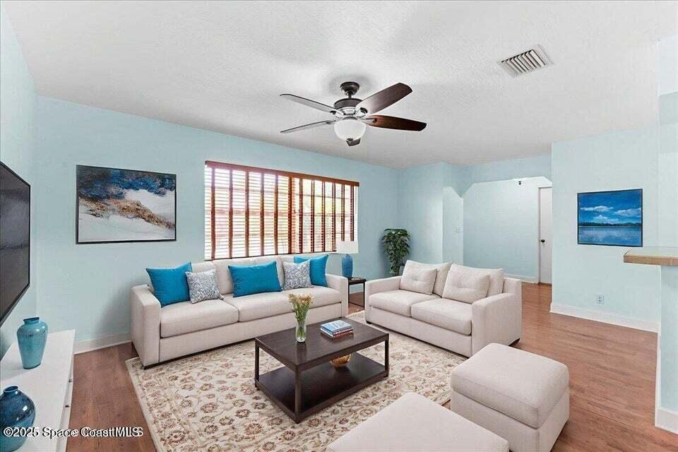 1527 Spruce Road Melbourne, FL 32935 - Photo 9 of 24 living room staged
