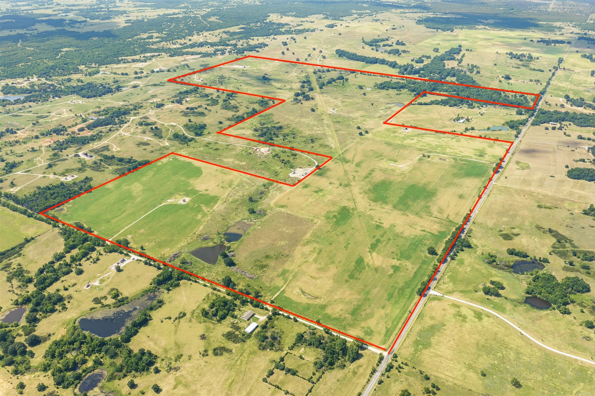 4 Keller Road Wilson, OK 73463 - Photo 1 of 32 Expansive rural landscape featuring a mix of open fields and scattered treelines