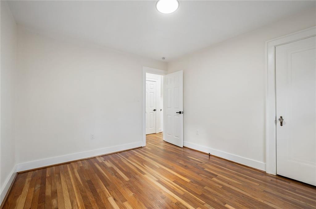 17 Wilkins Road Forest Hills, PA 15221 - Photo 15 of 24 a view of an empty room with wooden floor