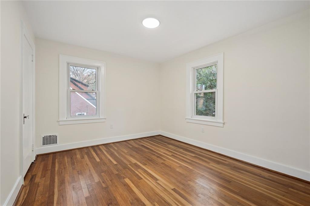 17 Wilkins Road Forest Hills, PA 15221 - Photo 16 of 24 wooden floor in an empty room with a window