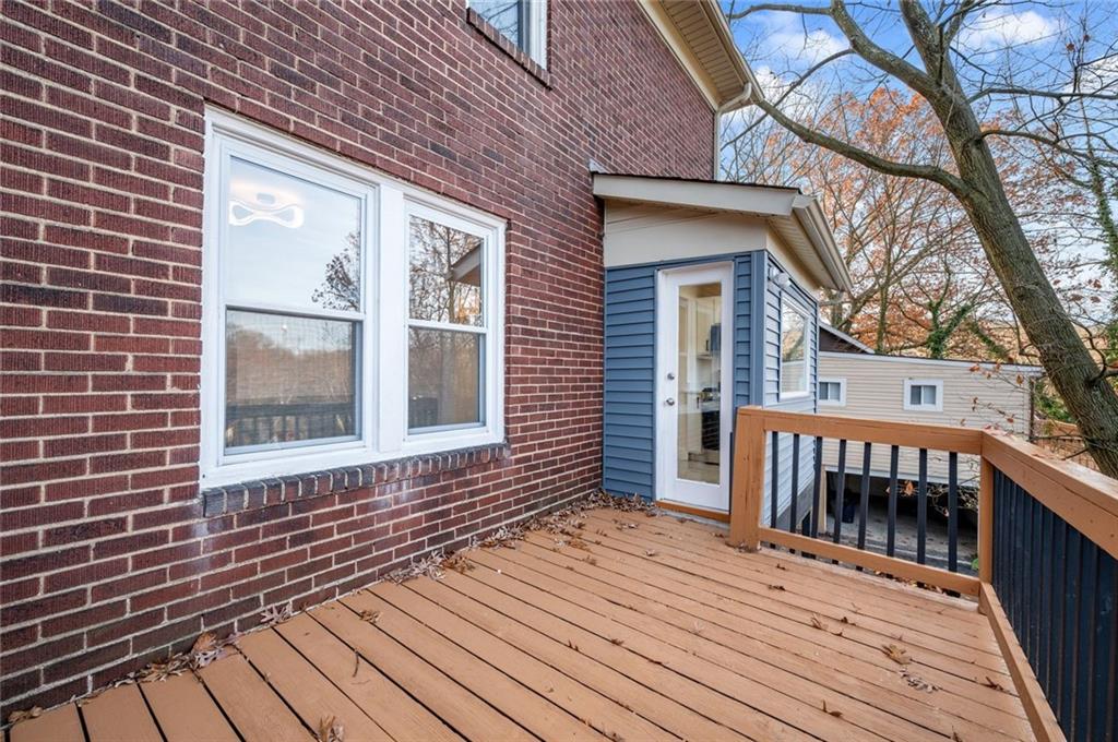17 Wilkins Road Forest Hills, PA 15221 - Photo 22 of 24 a view of a house with wooden deck and backyard