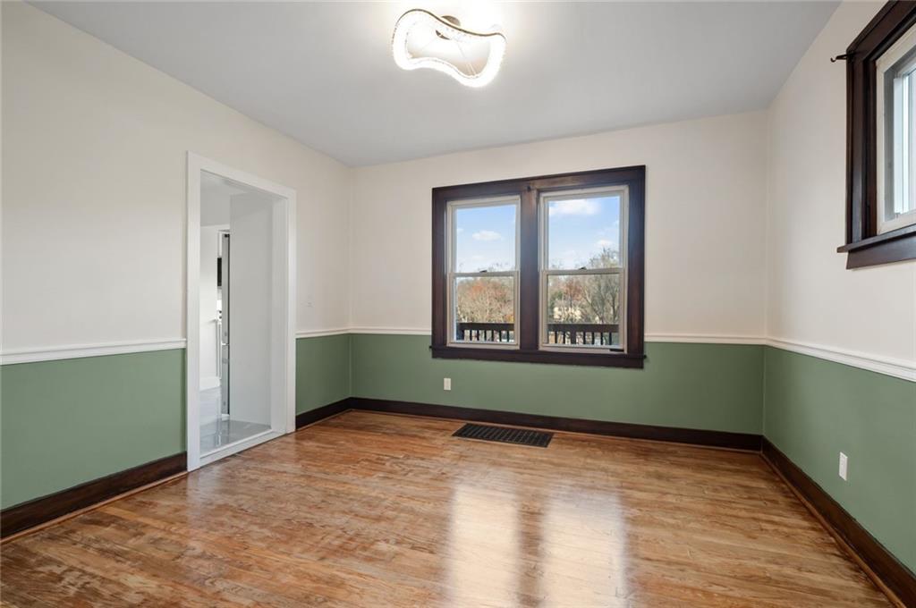 17 Wilkins Road Forest Hills, PA 15221 - Photo 7 of 24 a room with a window and a ceiling fan