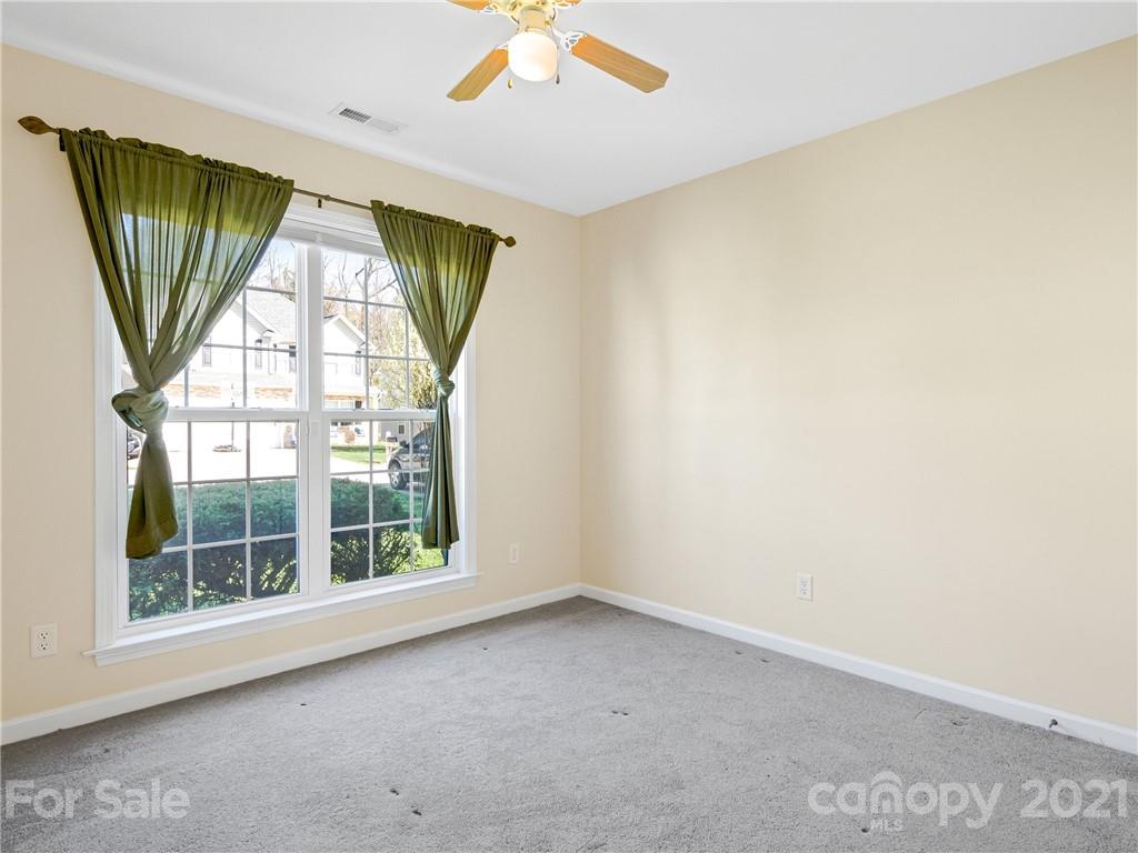 189 Black River Road Fletcher, NC 28732 - Photo 18 of 28 an empty room with a window and doors