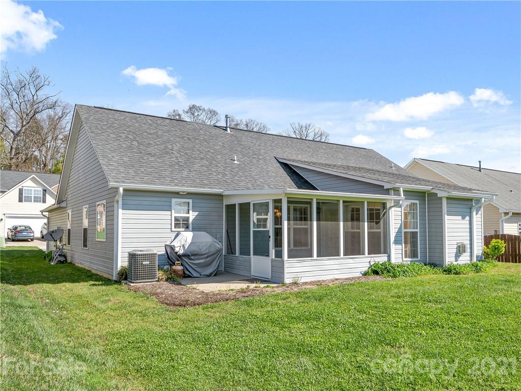 189 Black River Road Fletcher, NC 28732 - Photo 23 of 28 a house view with a garden space and garden