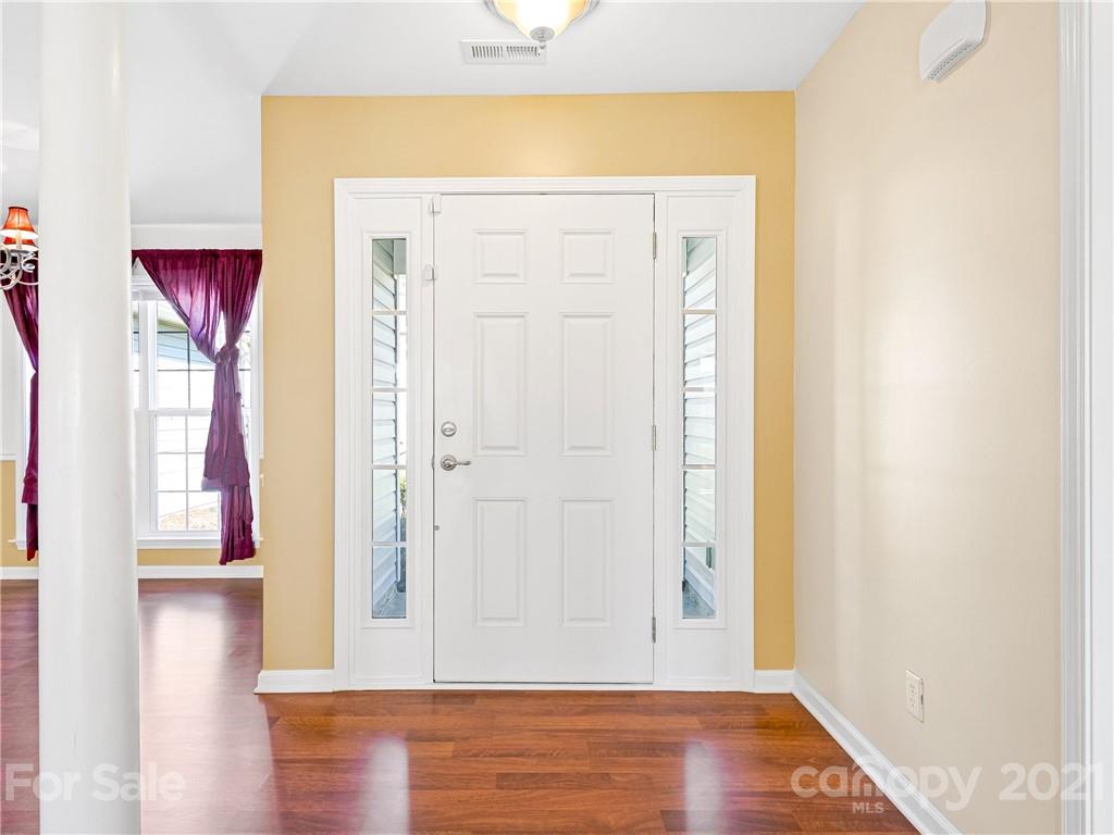 189 Black River Road Fletcher, NC 28732 - Photo 4 of 28 a view of a hallway with wooden floor