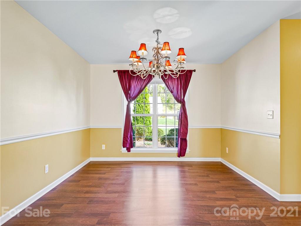 189 Black River Road Fletcher, NC 28732 - Photo 5 of 28 a view of a room with window and wooden floor