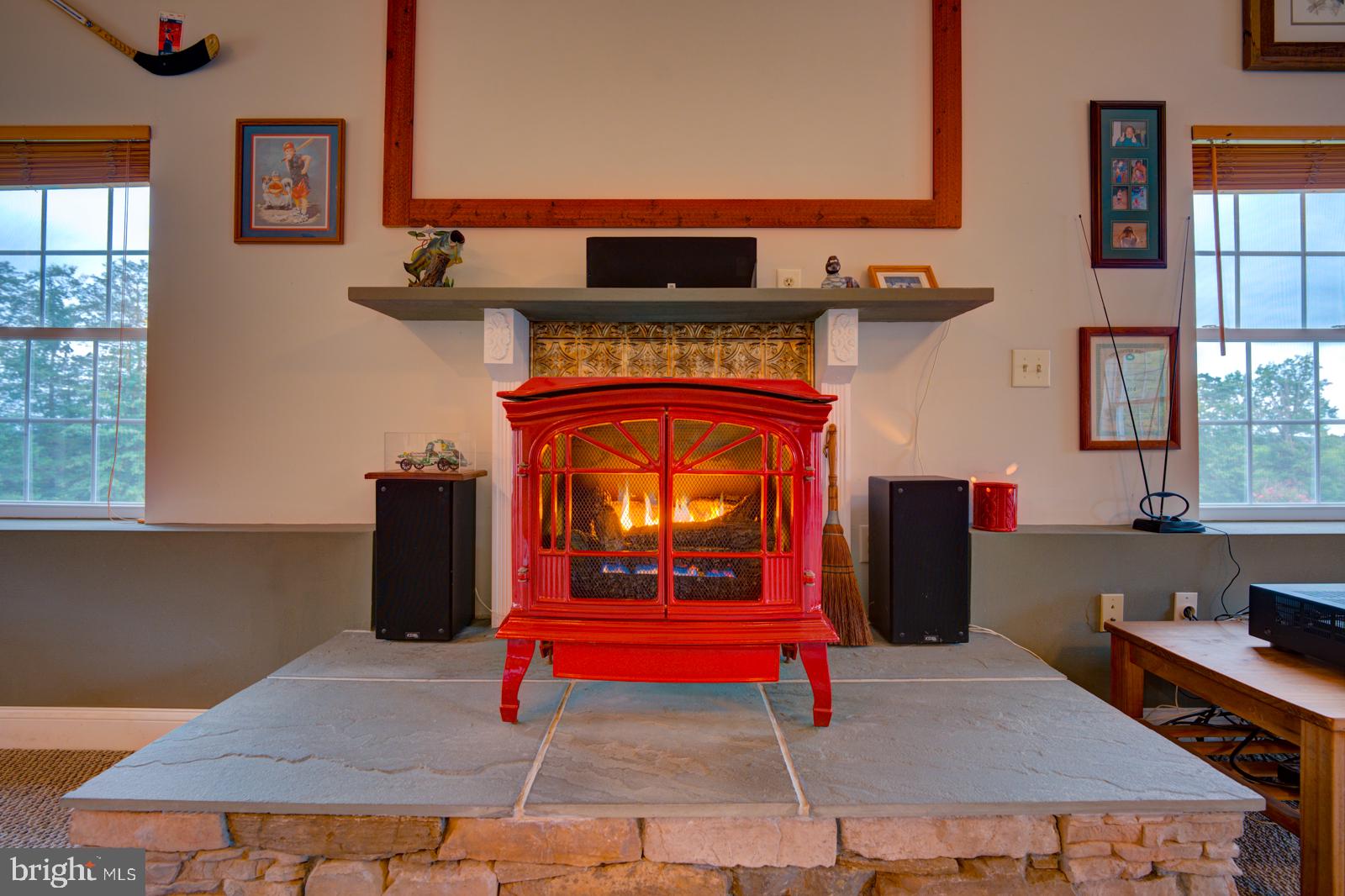 6542 Pine Stake Road Culpeper, VA 22701 - Photo 101 of 113 Cozy warmth in a vibrant hearth.