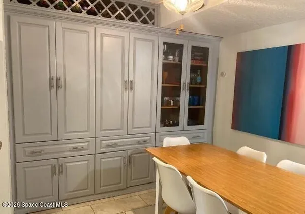 a room that has a bed and a window in it