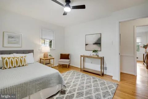 a bathroom with a sink vanity granite tub and shower