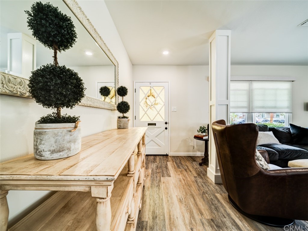 3758 Chatwin Avenue Long Beach, CA 90808 - Photo 13 of 34 a living room with furniture and a large window