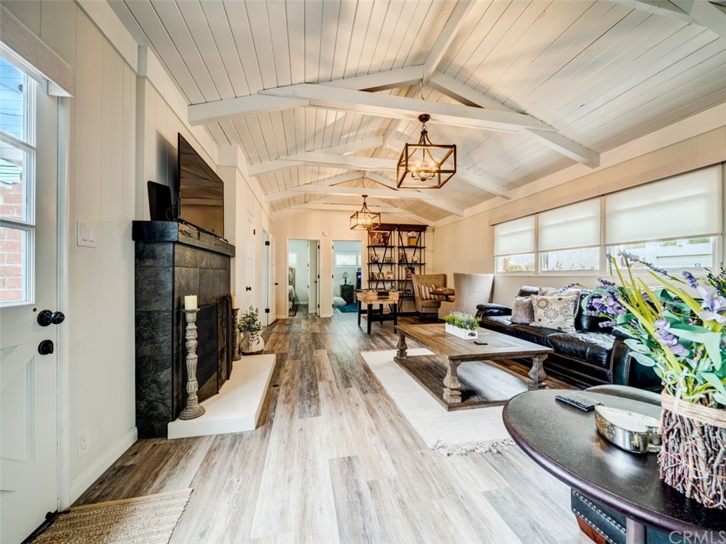 3758 Chatwin Avenue Long Beach, CA 90808 - Photo 16 of 34 a very nice looking room with a large window and furniture