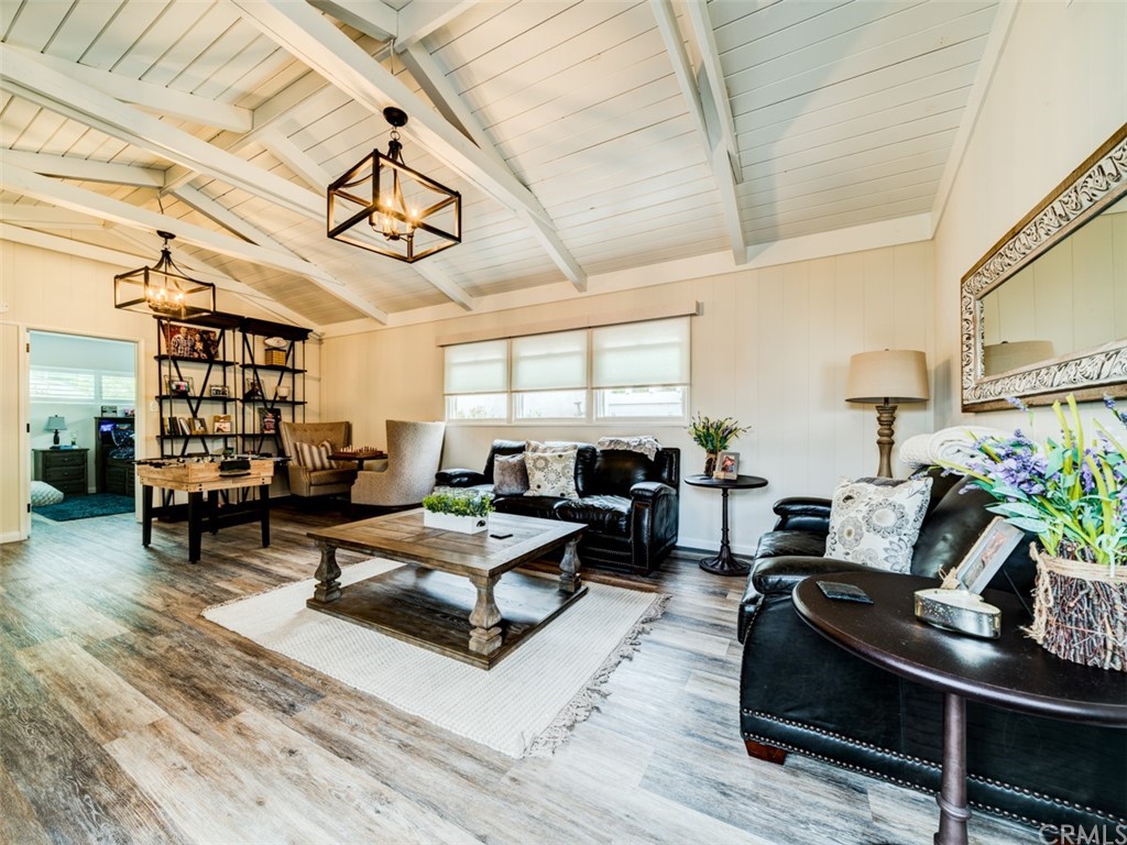 3758 Chatwin Avenue Long Beach, CA 90808 - Photo 17 of 34 a living room with furniture and wooden floor