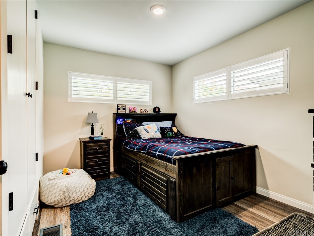 3758 Chatwin Avenue Long Beach, CA 90808 - Photo 23 of 34 a bedroom with a bed and a window