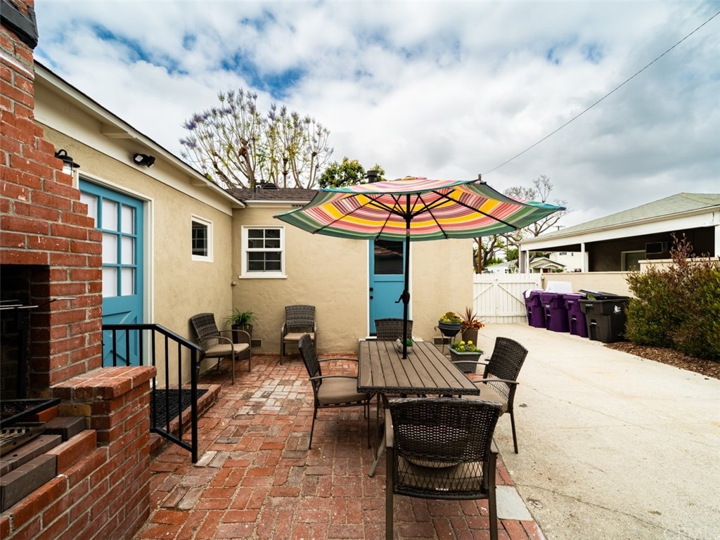 3758 Chatwin Avenue Long Beach, CA 90808 - Photo 32 of 34 a view of a dinning tables and chairs in patio
