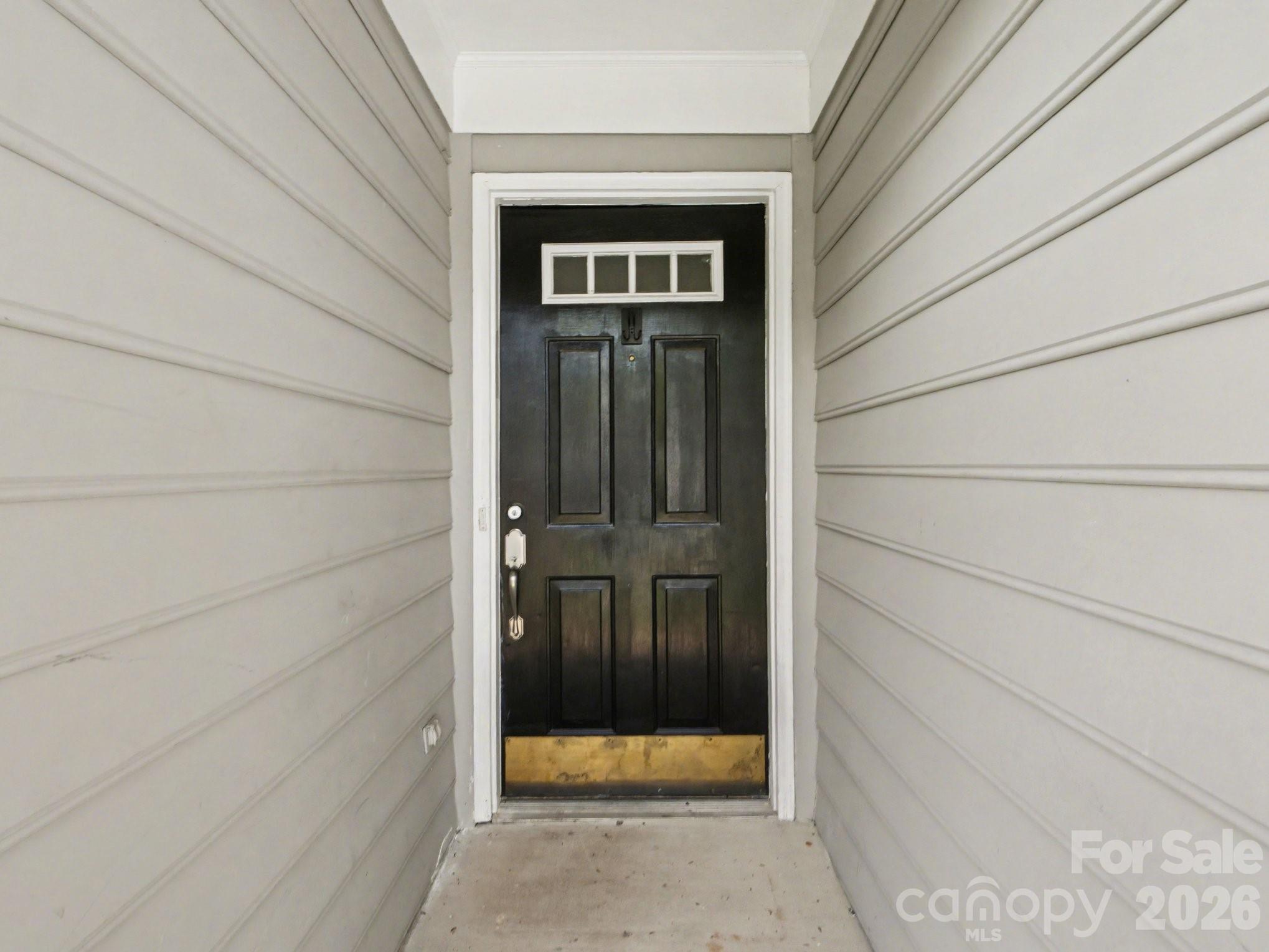 9214 Rotherham Lane Charlotte, NC 28216 - Photo 5 of 20 a view of front door