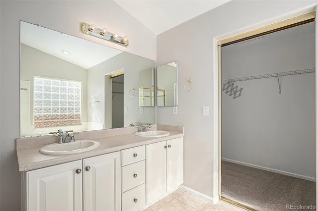 a bathroom with a tub and shower