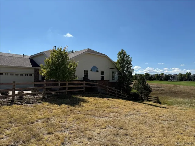 a front view of house with yard