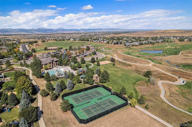 an aerial view of a house with a lake view