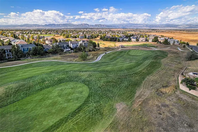 a view of a swimming pool with lake view and mountain view