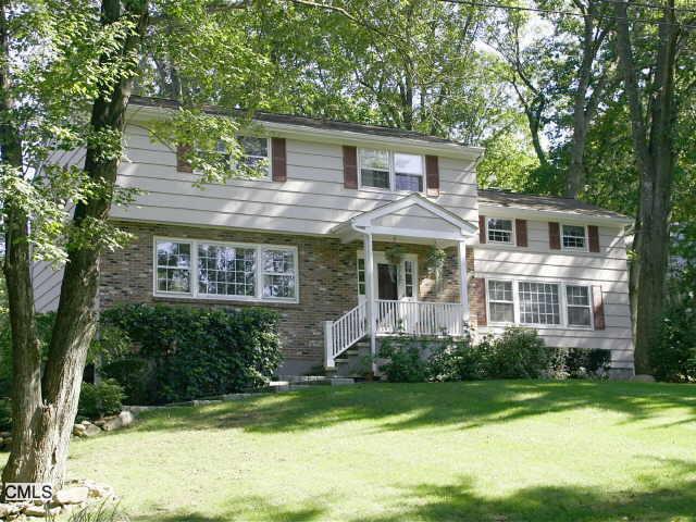 14 Overbrook Road Norwalk, CT 06851 - Photo 1 of 1 front view of a house with a yard