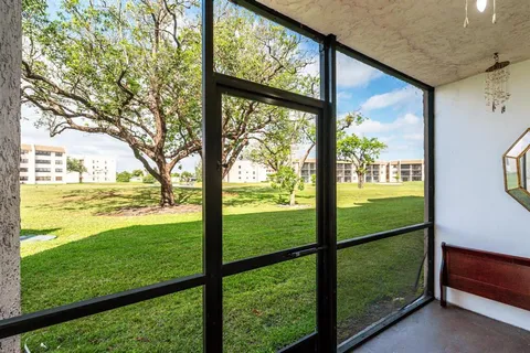 a view of outdoor space with seating area