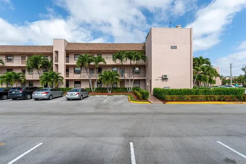 a view of street with parked cars