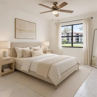 a bedroom with bed and window