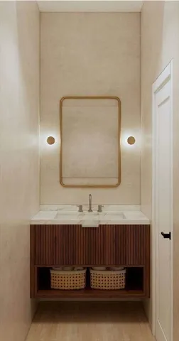 a kitchen with sink and cabinets