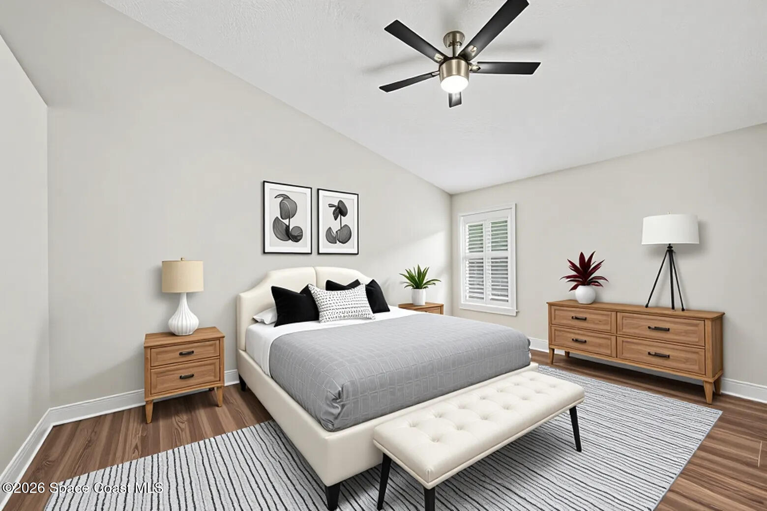 1424 Boca Rio Drive Melbourne, FL 32940 - Photo 24 of 50 a bedroom with a bed and wooden floor