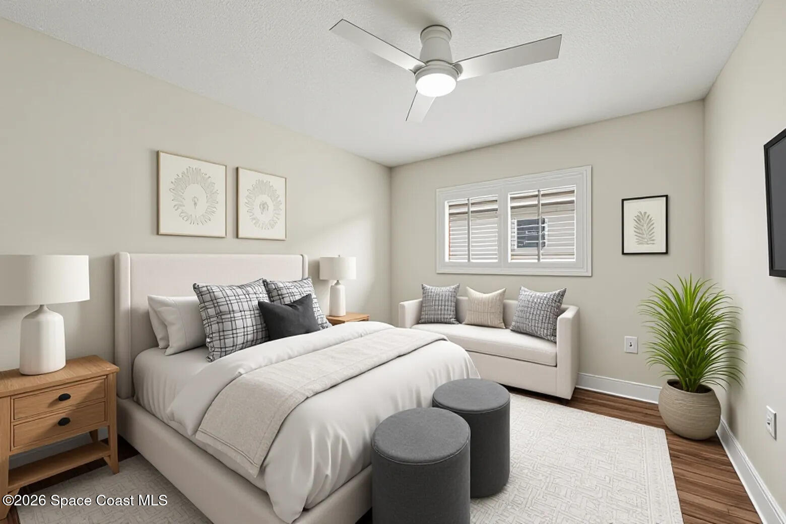 1424 Boca Rio Drive Melbourne, FL 32940 - Photo 34 of 50 a bedroom with a large bed and a couch