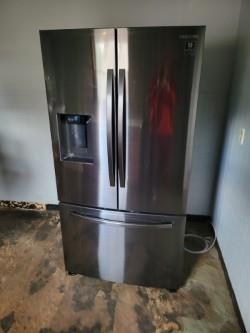 974 Hadley Drive Sharon, PA 16146 - Photo 11 of 11 a kitchen with a refrigerator and wooden floor