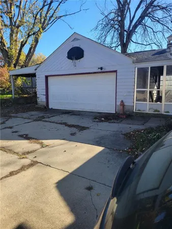 a view of a backyard with a barn