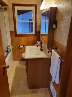 974 Hadley Drive Sharon, PA 16146 - Photo 5 of 11 a bathroom with a sink and a mirror