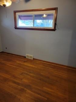 974 Hadley Drive Sharon, PA 16146 - Photo 7 of 11 a view of a room with wooden floor and small window