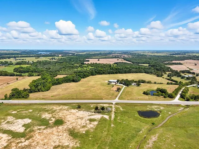 a view of a swimming pool and an outdoor space