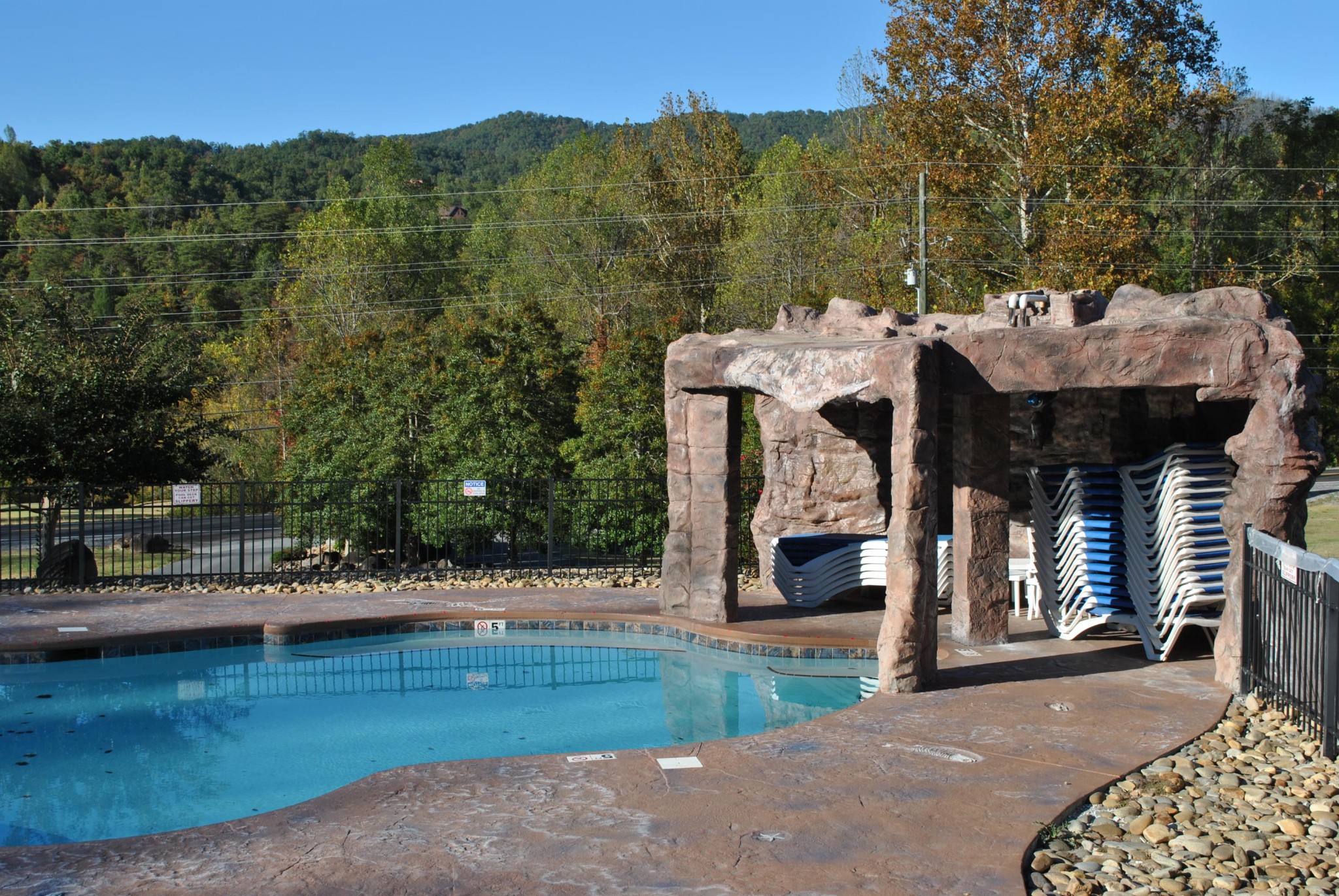 206 Forrest Loop Way, Unit 15 Gatlinburg, TN 37738 - Photo 7 of 8 a front view of a house with a yard