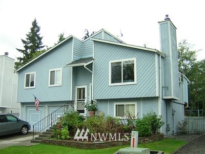 1728 225th Street Southeast Bothell, WA 98021 - Photo 1 of 1 a front view of a house with a yard
