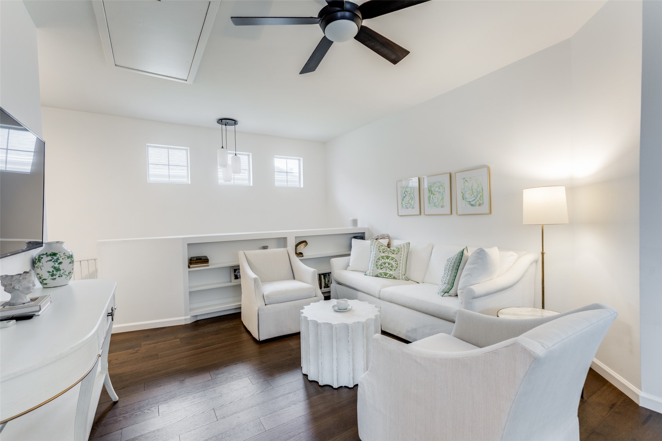 411 West St Elmo Road, Unit 35 Austin, TX 78745 - Photo 16 of 21 Living area with dark wood-type flooring and ceiling fan