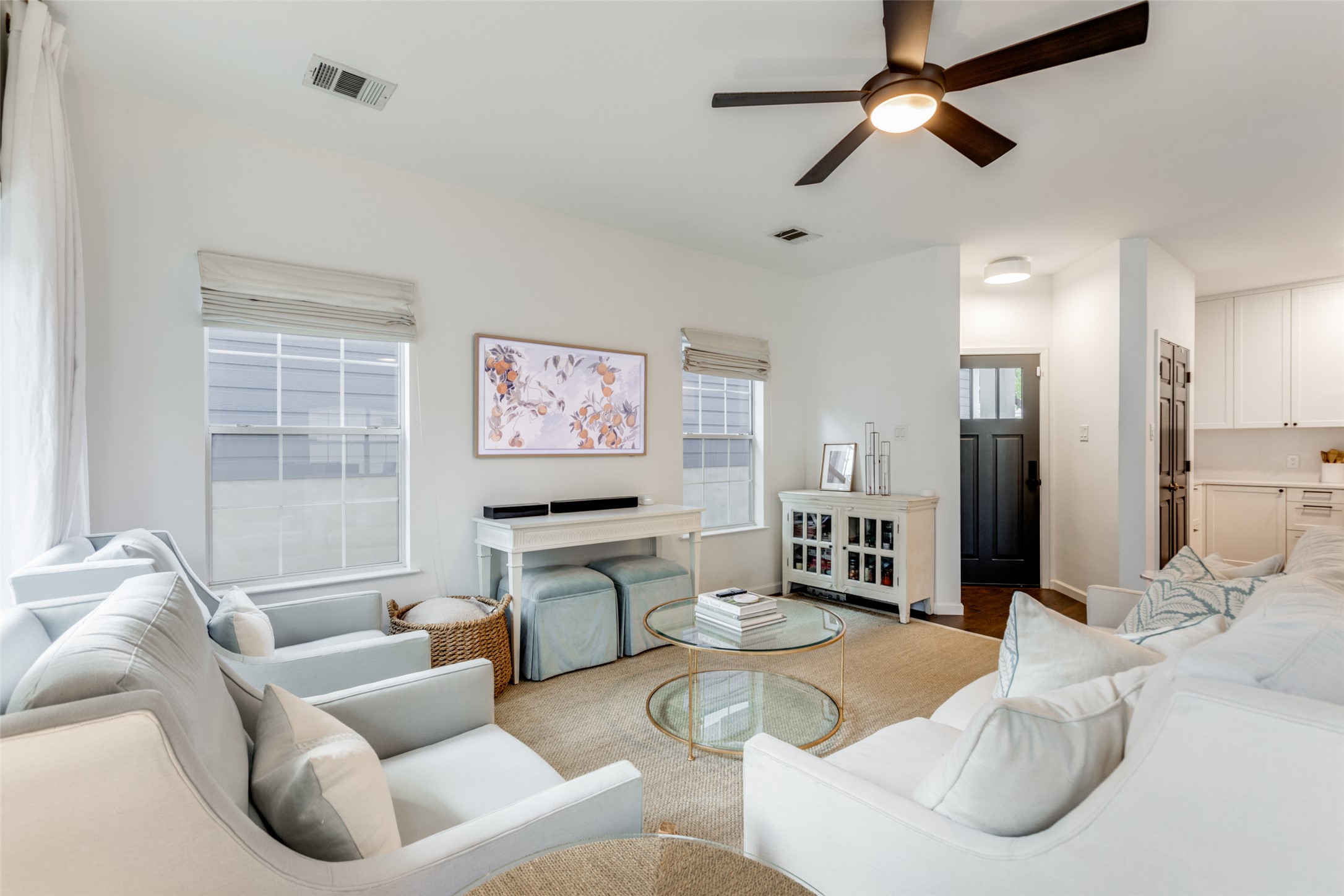 411 West St Elmo Road, Unit 35 Austin, TX 78745 - Photo 4 of 21 Living area featuring a ceiling fan