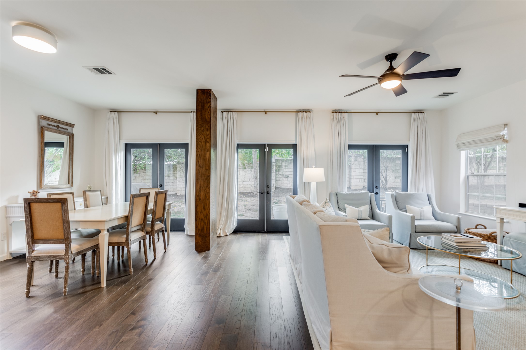 411 West St Elmo Road, Unit 35 Austin, TX 78745 - Photo 7 of 21 Living area featuring french doors, hardwood / wood-style flooring, and ceiling fan