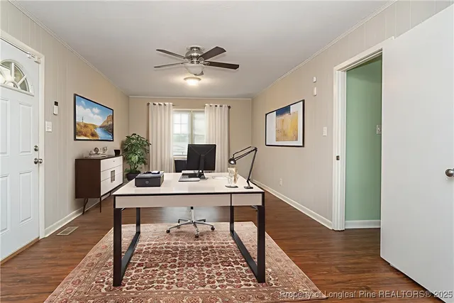 a view of a workspace with furniture