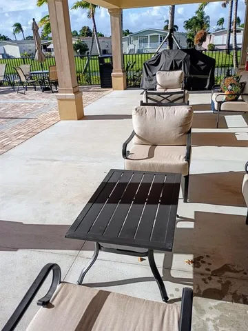 a building exterior with furniture