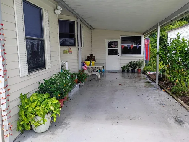 a view of a porch with furniture