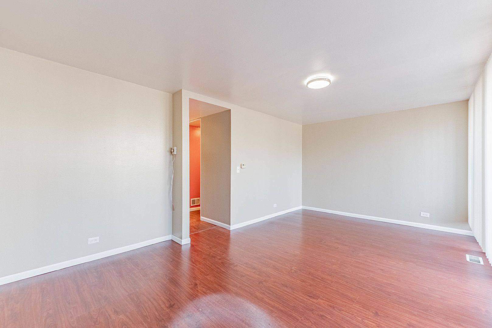 1320 West Arthington Street, Unit 1 Chicago, IL 60607 - Photo 4 of 19 a view of an empty room with wooden floor