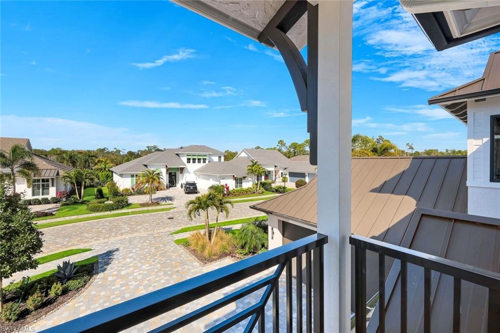 16728 Enclave Circle Naples, FL 34110 - Photo 5 of 49 Balcony with a residential view