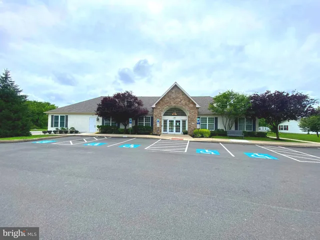 a view of street with houses on both side